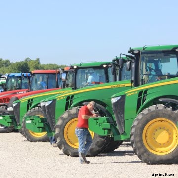 checking out used tractors at dealer lot