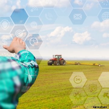 An illustration of smart farming with a tractor in the background.