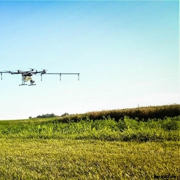 A man in shorts and a tshirt flies a Rantizo upgraded drone