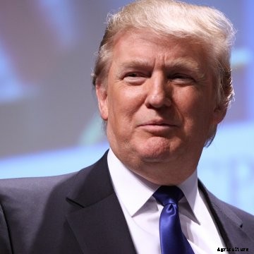 A close up of President Donald Trump smiling.