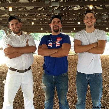 The three Miller sons pose on their Maryland dairy farm