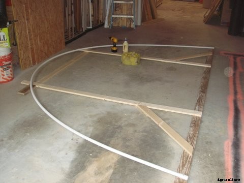 How to Build a Hoop House Greenhouse for $50