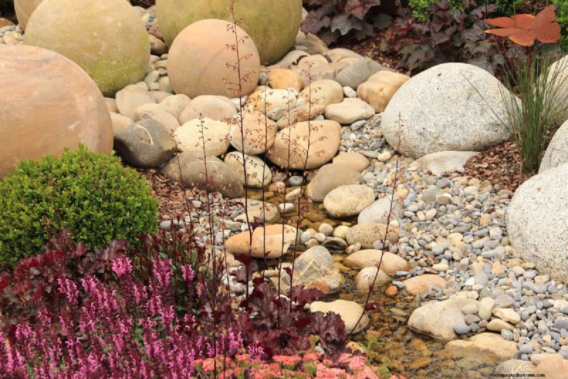 How To Clean Landscape Rocks Without Killing Plants?